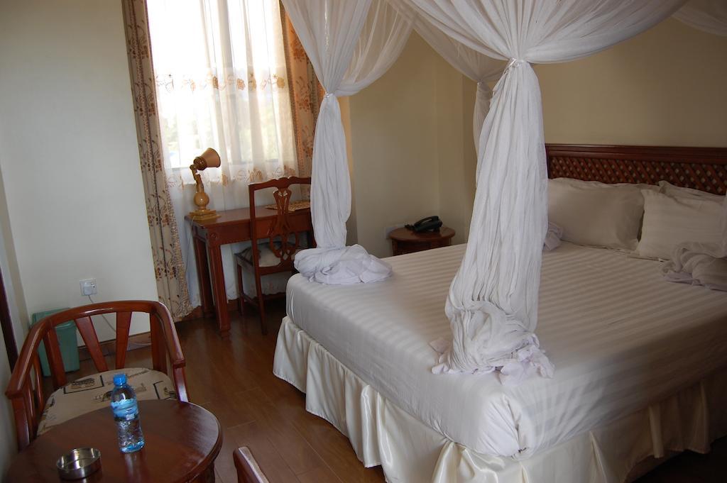 Arusha Tourist Inn Hotel Rom bilde
